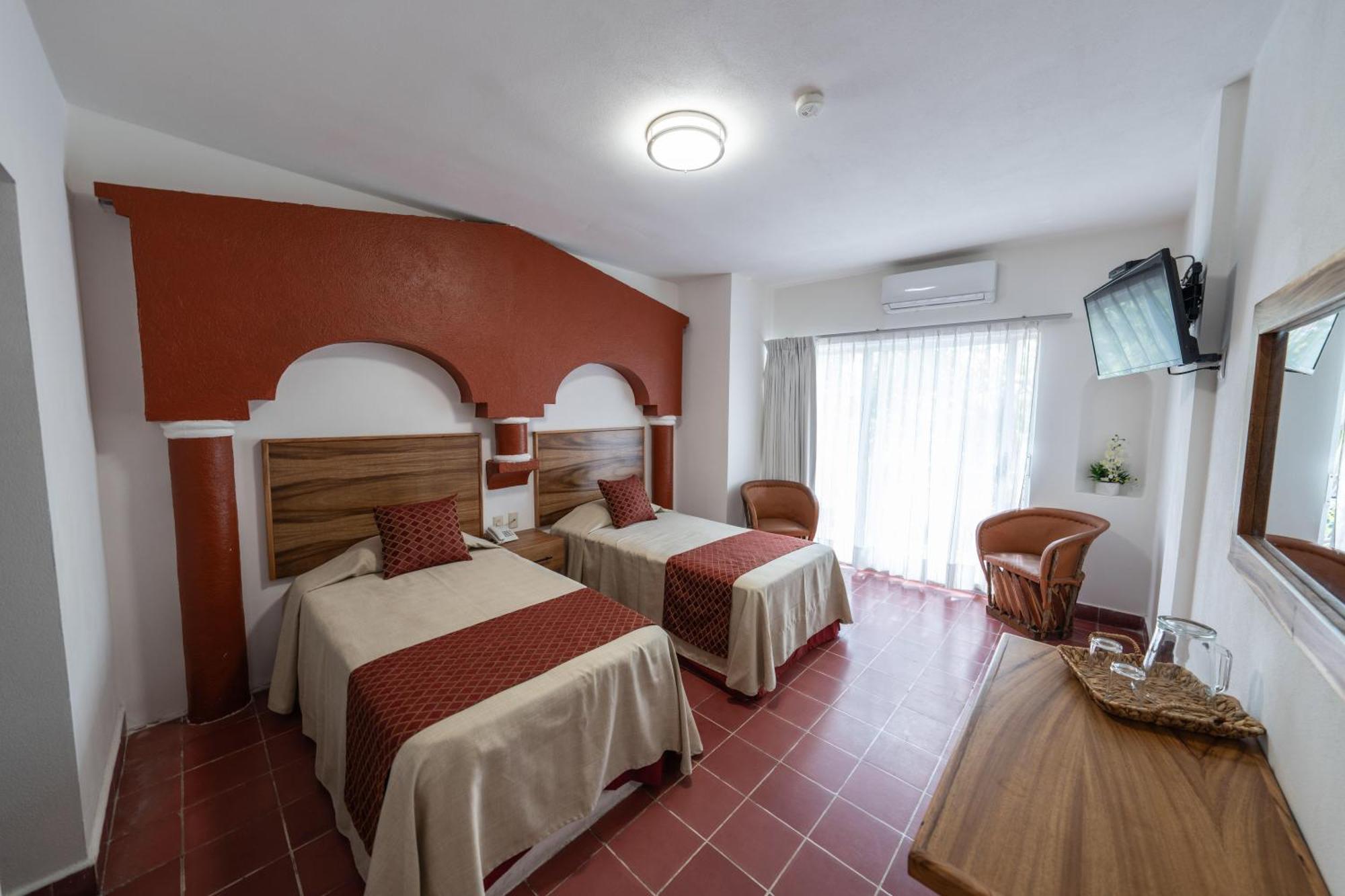 Hotel Encino Malecon Centro Пуэрто-Вальярта Номер фото