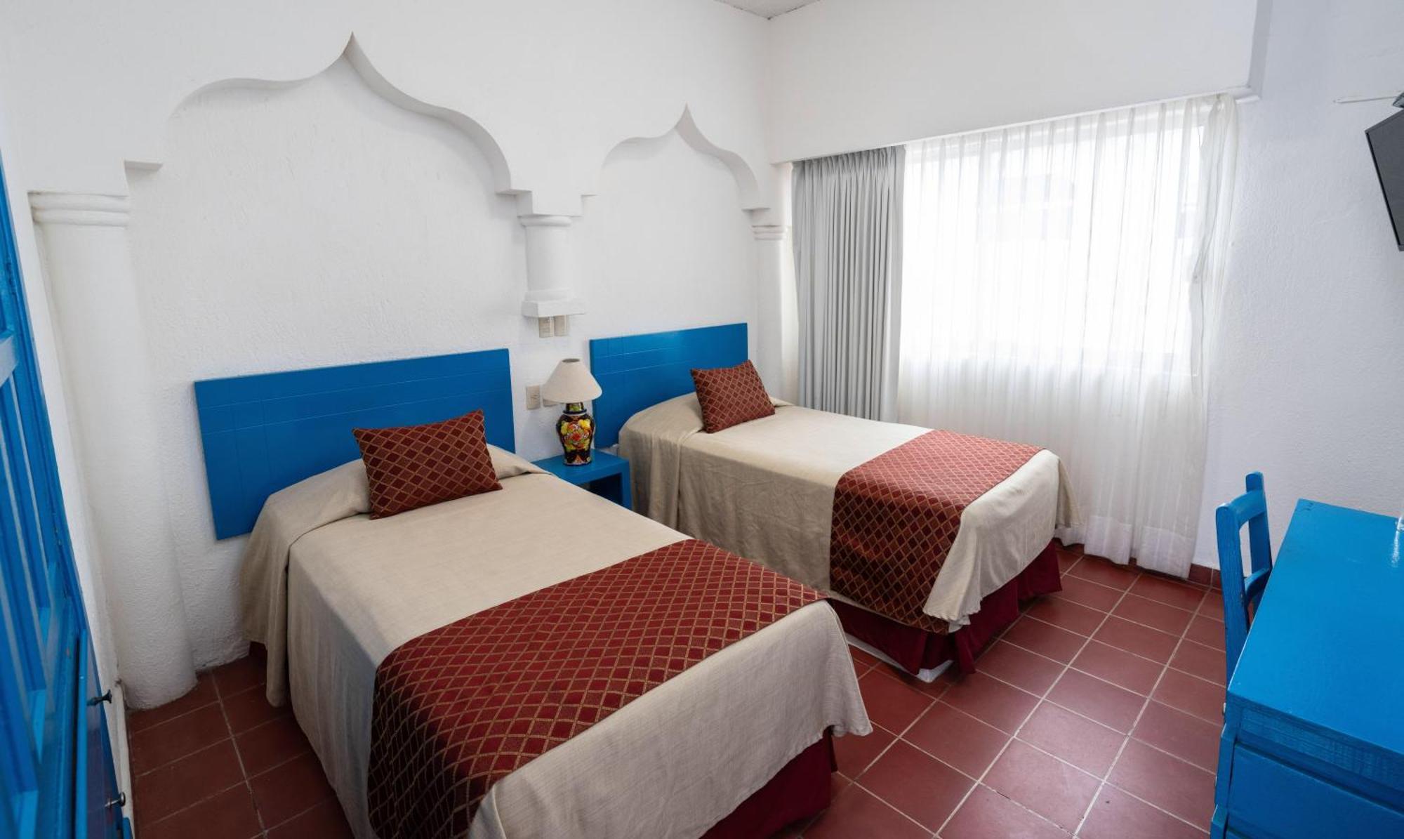 Hotel Encino Malecon Centro Пуэрто-Вальярта Номер фото
