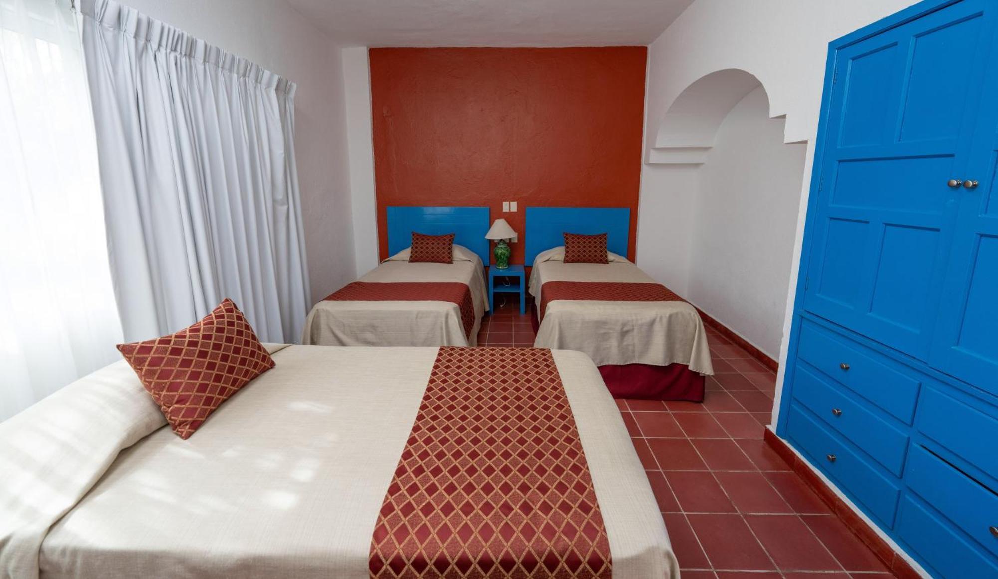 Hotel Encino Malecon Centro Пуэрто-Вальярта Номер фото