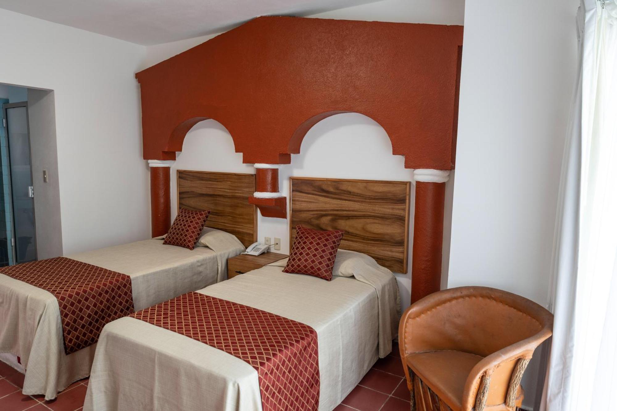 Hotel Encino Malecon Centro Пуэрто-Вальярта Номер фото