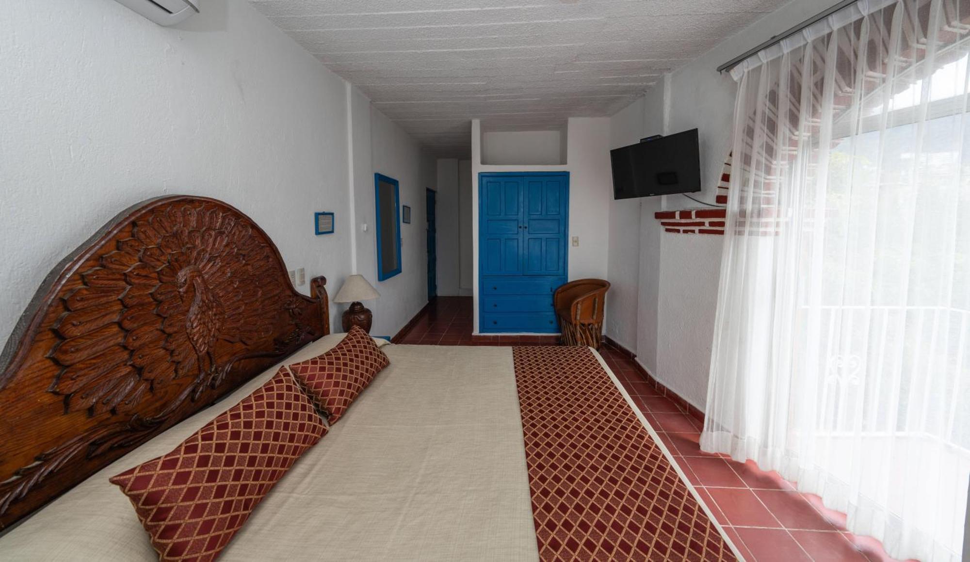 Hotel Encino Malecon Centro Пуэрто-Вальярта Номер фото